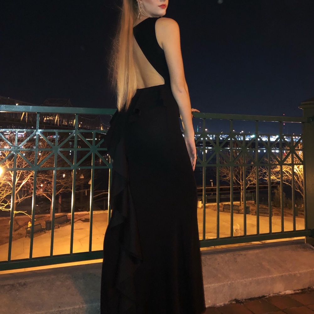 Formal full-length black-tie dress.